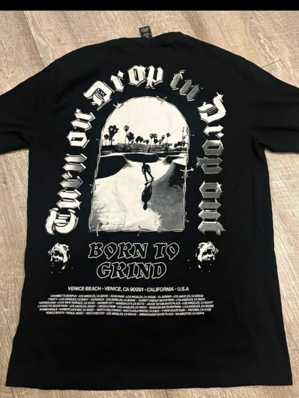 H&M graphic t-shirt featuring a "Born to Grind" Venice Beach